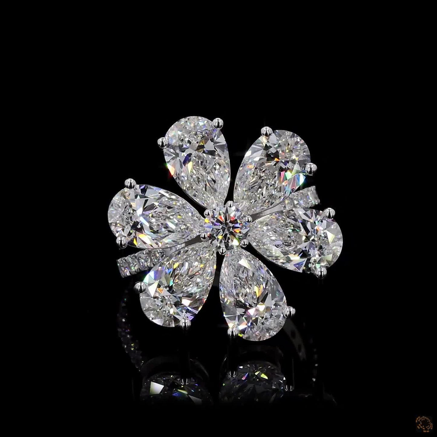 The Radiant White Gold Pear & Round Diamond Ring