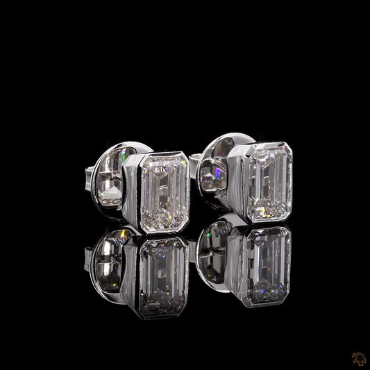 The Exquisite White Gold Emerald Cut Diamond Stud Earrings