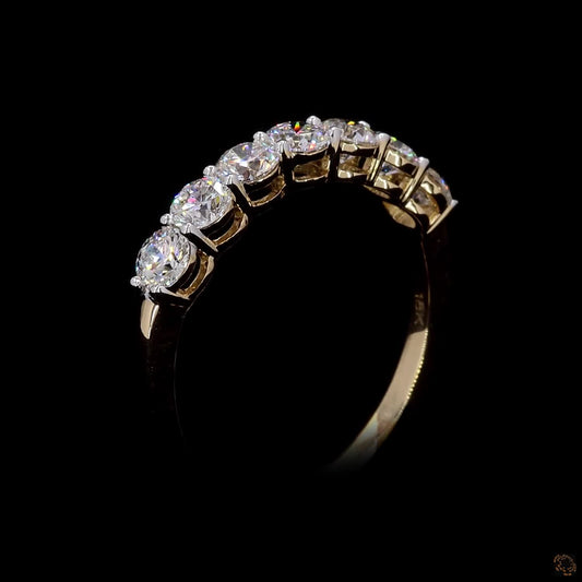 The Exquisite Yellow Gold Seven-Stone Diamond Ring