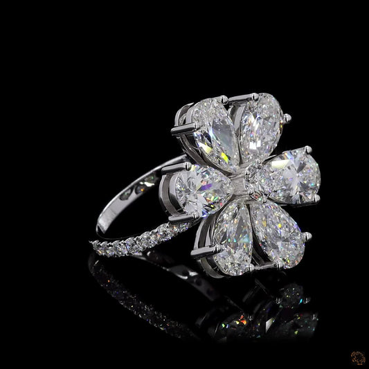 The Radiant White Gold Pear & Round Diamond Ring