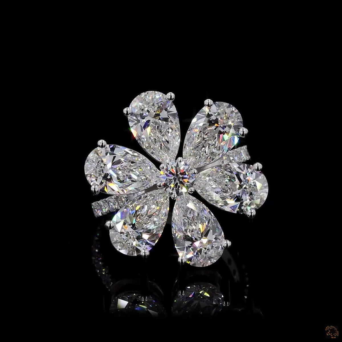 The Radiant White Gold Pear & Round Diamond Ring