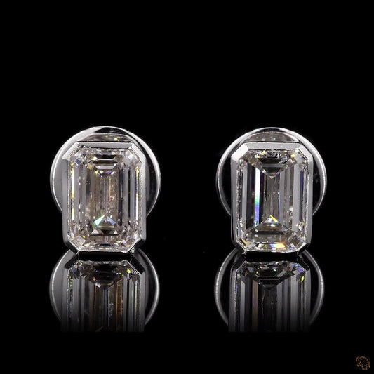 The Exquisite White Gold Emerald Cut Diamond Stud Earrings