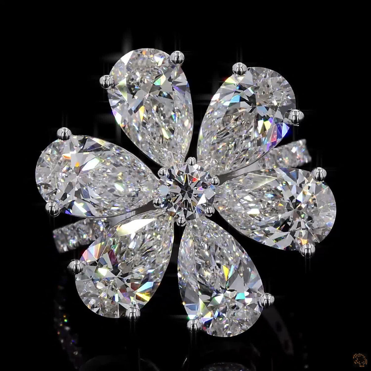 The Radiant White Gold Pear & Round Diamond Ring