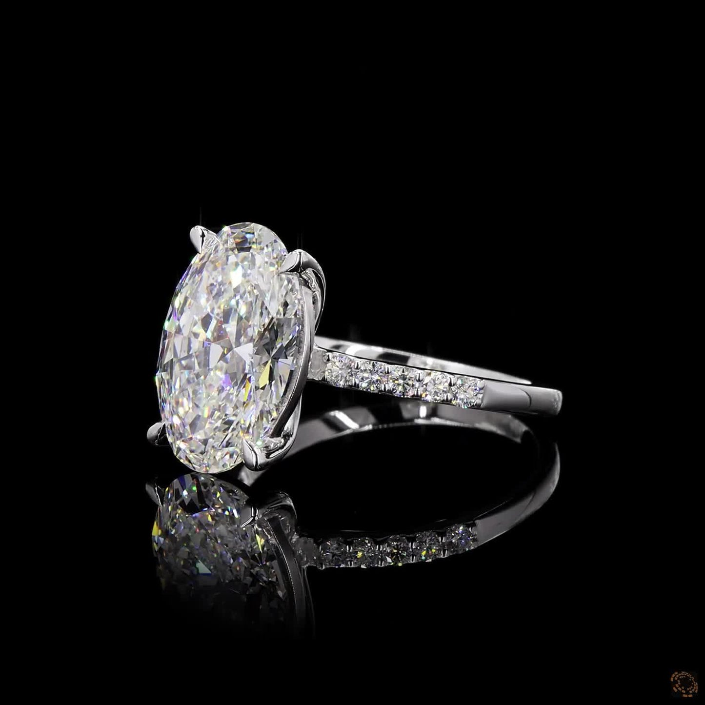 The Exquisite White Gold Oval & Round Diamond Ring