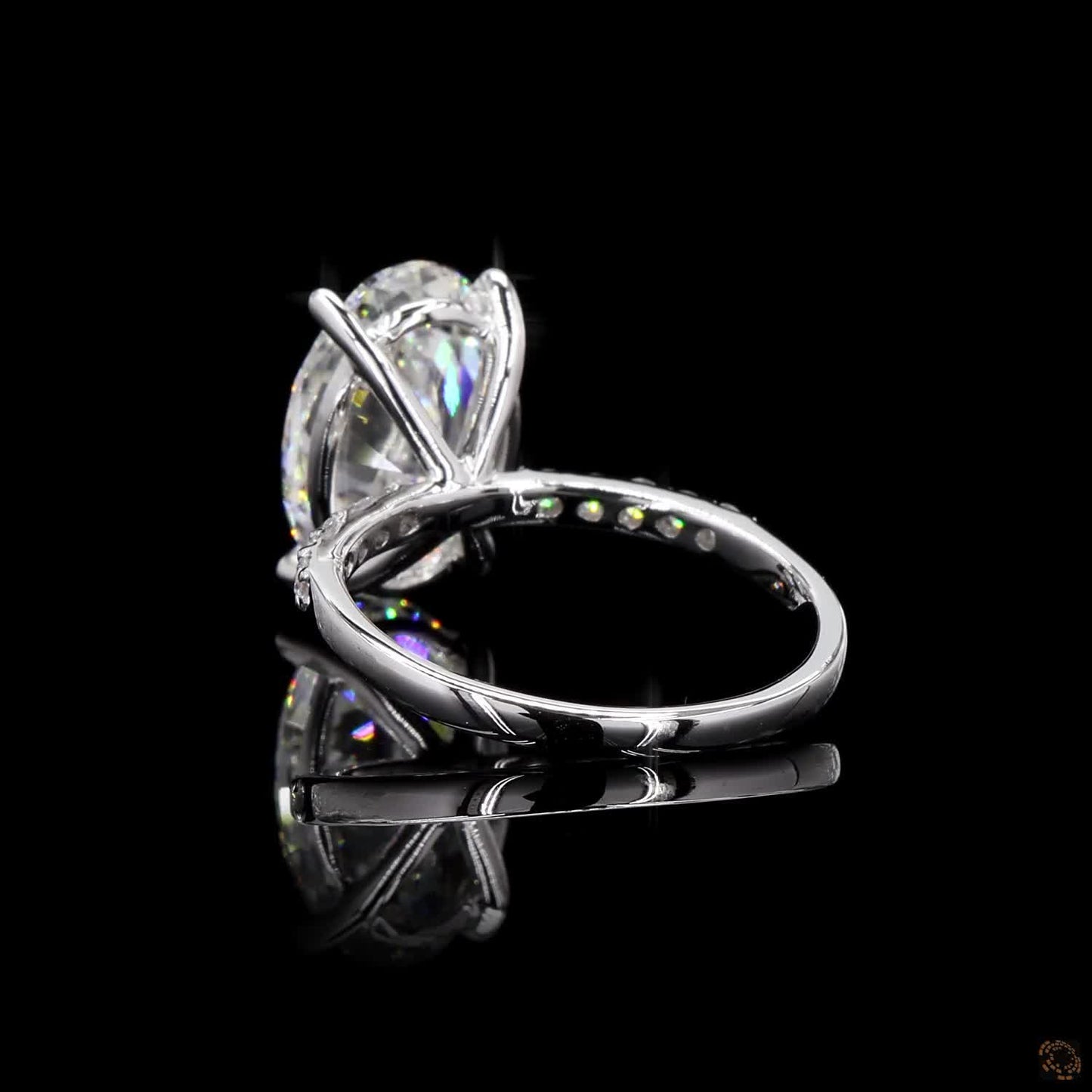 The Exquisite White Gold Oval & Round Diamond Ring