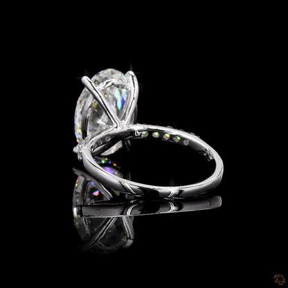 The Exquisite White Gold Oval & Round Diamond Ring