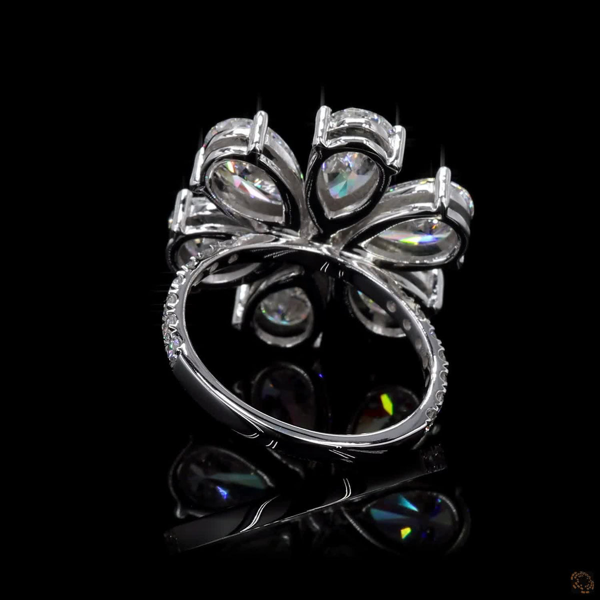 The Radiant White Gold Pear & Round Diamond Ring