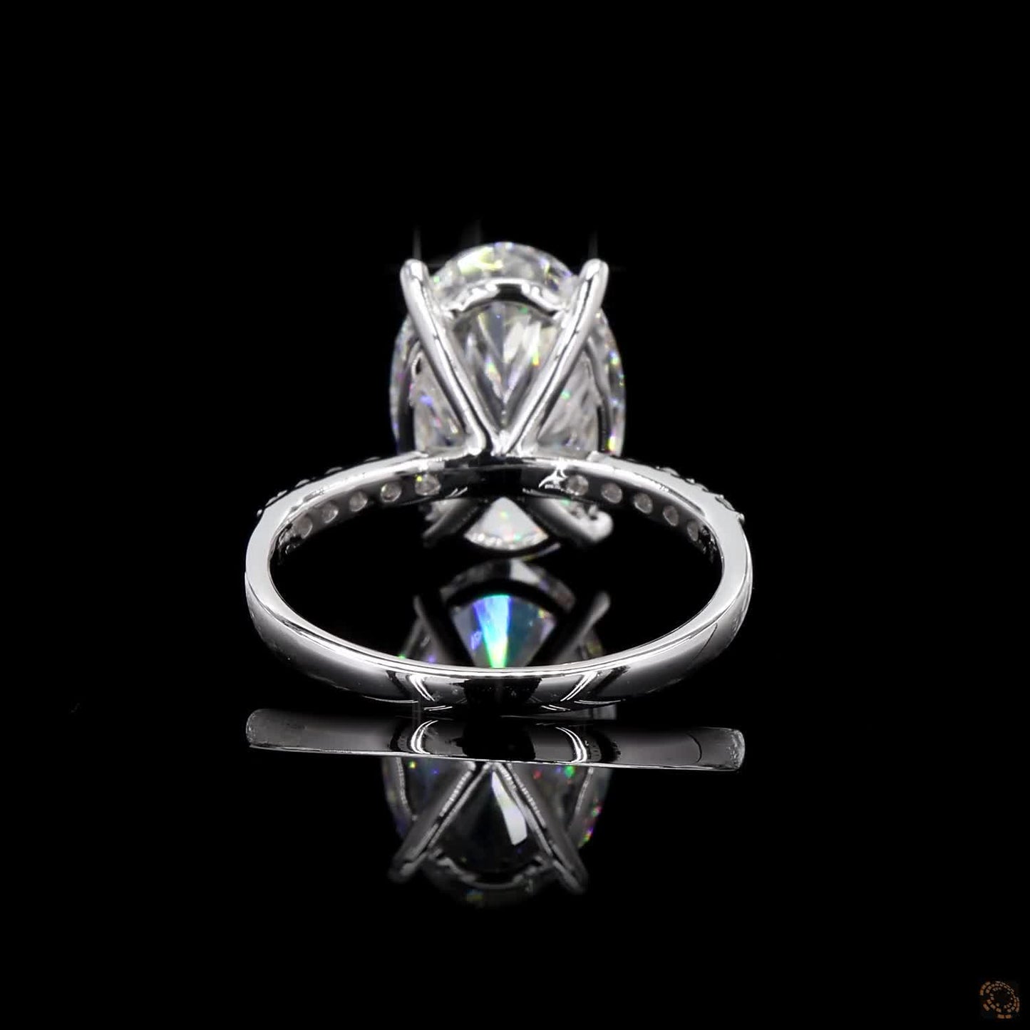 The Exquisite White Gold Oval & Round Diamond Ring