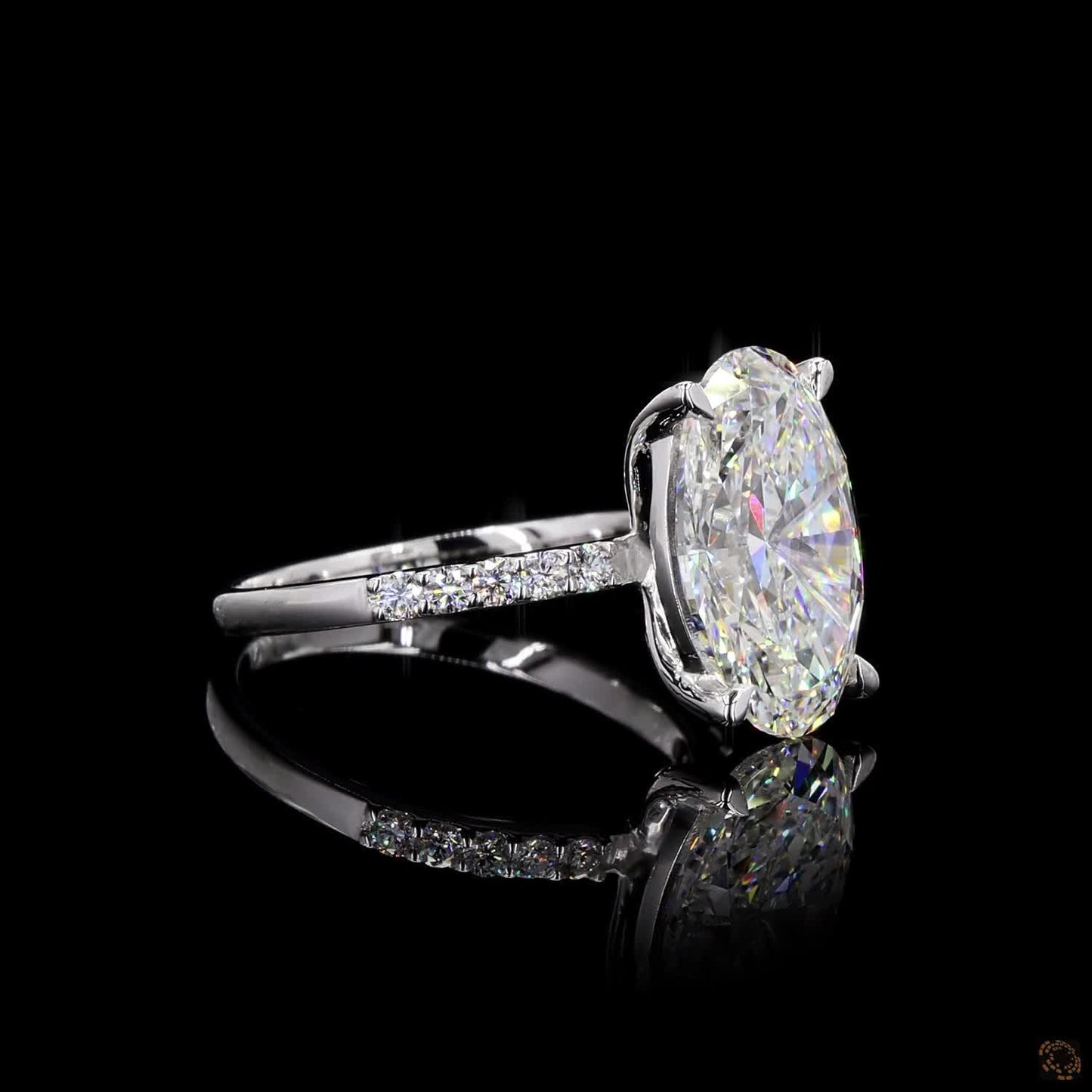 The Exquisite White Gold Oval & Round Diamond Ring