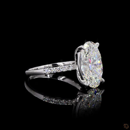 The Exquisite White Gold Oval & Round Diamond Ring