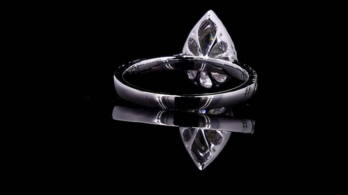 1.34 CT Pear Cut Lab Grown Diamond Halo Ring