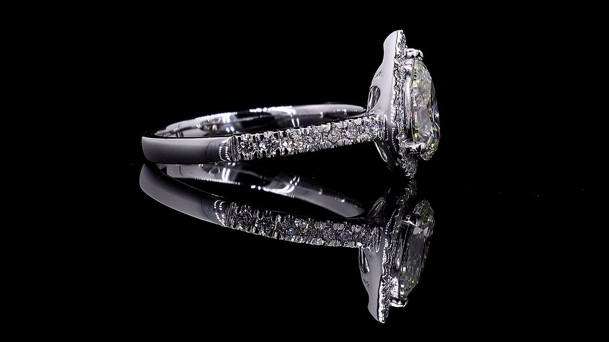 1.34 CT Pear Cut Lab Grown Diamond Halo Ring